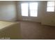 Hallway showcasing windows providing ample natural light at 5308 La Quinta Hills St, North Las Vegas, NV 89081