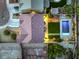 Zenith view of a home with a private backyard oasis, including a pool, patio, and lush landscaping at 5480 Oatfield St, North Las Vegas, NV 89081