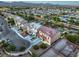 Aerial view of a two-story house with a pool in the backyard next to well-manicured landscaping at 5480 Oatfield St, North Las Vegas, NV 89081