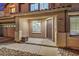 Covered porch with well-maintained hardscape that leads to front door at 5480 Oatfield St, North Las Vegas, NV 89081