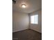 Carpeted bedroom featuring a window for natural light at 5509 Big Sky Ln, Las Vegas, NV 89149