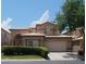 Charming two-story home with a well-manicured lawn and a two-car garage at 5509 Big Sky Ln, Las Vegas, NV 89149