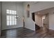 Open-concept living room with new floors, stairs and high ceilings at 5509 Big Sky Ln, Las Vegas, NV 89149