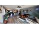 Bright living room features hardwood floors and a unique, open design at 5817 Rae Dr, Las Vegas, NV 89108