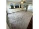 Bedroom featuring carpeted flooring, a ceiling fan, and a wall mural at 600 Woodmount Dr, Las Vegas, NV 89107