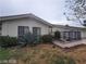 Attractive single-story home featuring well-maintained landscaping at 600 Woodmount Dr, Las Vegas, NV 89107