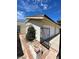 Home featuring an attached two-car garage with a gated entry at 600 Woodmount Dr, Las Vegas, NV 89107
