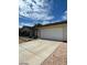 Attached two-car garage offering convenient parking and storage at 600 Woodmount Dr, Las Vegas, NV 89107