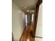Hallway with wood flooring leading to other rooms in the house at 600 Woodmount Dr, Las Vegas, NV 89107