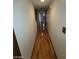 Hallway featuring wood flooring and access to various rooms at 600 Woodmount Dr, Las Vegas, NV 89107