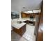 Bright kitchen with tile countertops and stainless steel appliances at 600 Woodmount Dr, Las Vegas, NV 89107