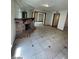 Spacious living room featuring a fireplace and tile flooring at 600 Woodmount Dr, Las Vegas, NV 89107