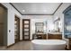Luxurious bathroom with a soaking tub, dual vanities, and a separate shower at 64 Tapadero Ln, Las Vegas, NV 89135