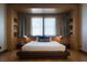 Stylish bedroom with custom wood detail, ambient lighting, and a platform bed at 64 Tapadero Ln, Las Vegas, NV 89135