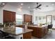 Gourmet kitchen features custom cabinetry, granite countertops, and stainless steel appliances at 64 Tapadero Ln, Las Vegas, NV 89135