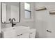 Updated bathroom featuring a modern sink vanity and contemporary fixtures at 6445 Ironbark Ln, Las Vegas, NV 89107