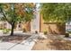 Exterior view of the property featuring well-maintained landscaping and desert-friendly design at 6871 Tamarus St # 204, Las Vegas, NV 89119