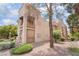 Well-maintained building exterior featuring private balconies and desert landscaping at 6871 Tamarus St # 204, Las Vegas, NV 89119