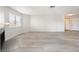 Bright living room with wood floors, neutral walls, and cozy fireplace at 6871 Tamarus St # 204, Las Vegas, NV 89119