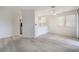 Open floorplan featuring wood floors, neutral walls, and modern ceiling fan at 6871 Tamarus St # 204, Las Vegas, NV 89119