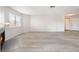 Bright living room with wood floors, neutral walls, and cozy fireplace at 6871 Tamarus St # 204, Las Vegas, NV 89119