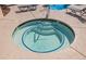 Relaxing hot tub with clear blue water, surrounded by lounge chairs for ultimate comfort at 7400 W Flamingo Rd # 1082, Las Vegas, NV 89147