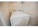 Bright laundry room with a white dryer unit, showcasing simplicity and functionality at 7400 W Flamingo Rd # 1082, Las Vegas, NV 89147