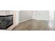 Cozy living room with fireplace, wood floors, and an inviting atmosphere at 7400 W Flamingo Rd # 1082, Las Vegas, NV 89147