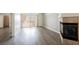 Bright and airy living room with fireplace and sliding doors to the outside patio at 7400 W Flamingo Rd # 1082, Las Vegas, NV 89147
