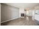 Inviting living room with stylish fireplace, wood floors, and ample natural light at 7400 W Flamingo Rd # 1082, Las Vegas, NV 89147