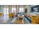 Bright living room showcasing modern furniture, large windows, and stylish decor at 7915 Pandora Sky St # 402, North Las Vegas, NV 89084