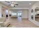 Open concept living room featuring tile floors, fireplace, recessed lights and plenty of space at 8221 Bay Dunes St, Las Vegas, NV 89131