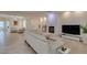 Cozy living room with fireplace, recessed lighting, and open layout to other areas at 8221 Bay Dunes St, Las Vegas, NV 89131