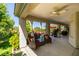 Charming covered patio offers a relaxing outdoor space with comfortable seating at 8221 Bay Dunes St, Las Vegas, NV 89131