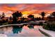 Sparkling swimming pool with decorative landscaping and waterfall features at 8221 Bay Dunes St, Las Vegas, NV 89131
