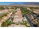 Aerial view featuring a neighborhood with many houses and landscaped yards at 8221 Bay Dunes St, Las Vegas, NV 89131