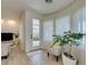 Sun room featuring lots of natural light, tile flooring and a comfortable sitting area at 8221 Bay Dunes St, Las Vegas, NV 89131
