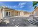 Spacious backyard with a covered patio, low-maintenance landscaping, and plenty of room for outdoor activities at 839 Benita Pl, Boulder City, NV 89005