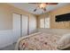 Bedroom featuring a window with shutters and a ceiling fan at 839 Benita Pl, Boulder City, NV 89005