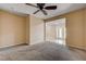 Inviting carpeted bedroom that opens to a bright tiled area with French doors at 839 Benita Pl, Boulder City, NV 89005