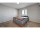 Neutral bedroom featuring a window with shutters at 839 Benita Pl, Boulder City, NV 89005