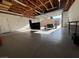 Spacious garage featuring high ceilings, an open garage door, and room for multiple cars or storage at 839 Benita Pl, Boulder City, NV 89005