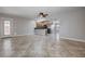 Open living space flowing into a kitchen, complemented by tile flooring at 839 Benita Pl, Boulder City, NV 89005