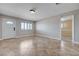 Bright living area with tile flooring, shutters, and neutral paint at 839 Benita Pl, Boulder City, NV 89005