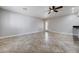 Living room features tile floors and easy access to the rear patio at 839 Benita Pl, Boulder City, NV 89005
