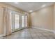 Bright room with tile floors and French doors, offering a serene and inviting atmosphere at 839 Benita Pl, Boulder City, NV 89005