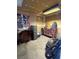 Unfinished storage space with boxes, cabinets, file cabinet, and random decor at 839 Benita Pl, Boulder City, NV 89005