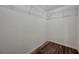 Empty walk-in closet with dark wood floors and a built-in wire shelving unit at 839 Benita Pl, Boulder City, NV 89005