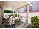 Back patio with a covered area, furniture, and grill is perfect for outdoor entertaining and relaxing at 8437 Cinnamon Hill Ave, Las Vegas, NV 89129