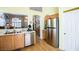 Bright kitchen with stainless steel appliances and wood cabinets, offering a convenient layout at 8437 Cinnamon Hill Ave, Las Vegas, NV 89129
